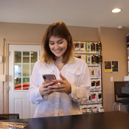 Using a phone in a GBT store.