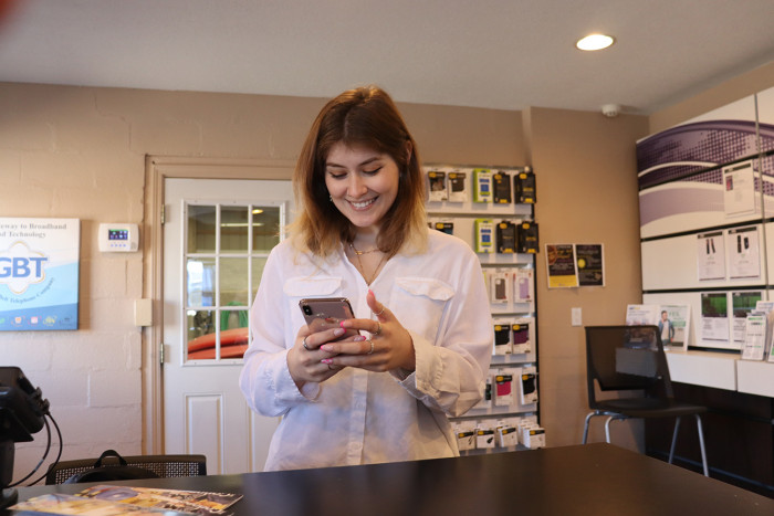 Using a phone in a GBT store.